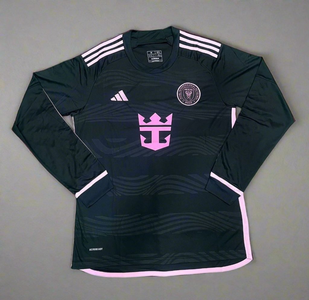 Inter Miami away jersey, dark green with pink accents and sponsor logos.